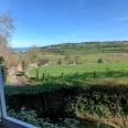 Maison vue sur mer à vendre à Hautot sur Mer entourée de bois