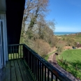 Maison vue sur mer à vendre à Hautot sur Mer entourée de bois