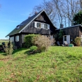 Maison vue sur mer à vendre à Hautot sur Mer entourée de bois